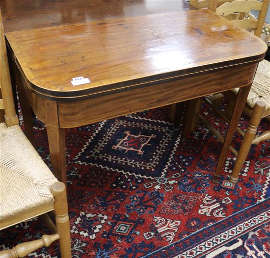 A George III inlaid mahogany card table, W.92cm